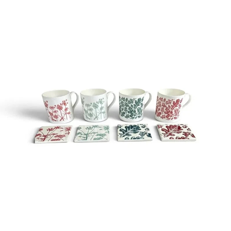 Pembrokeshire Creations & Beyond ceramic mug and coaster sets featuring intricate botanical prints in earthy tones.